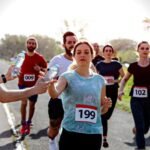 Men and women developing a Pacing Strategy for a Metro Dash